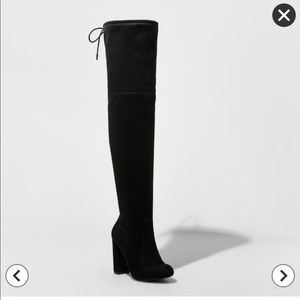 Thigh high black boots